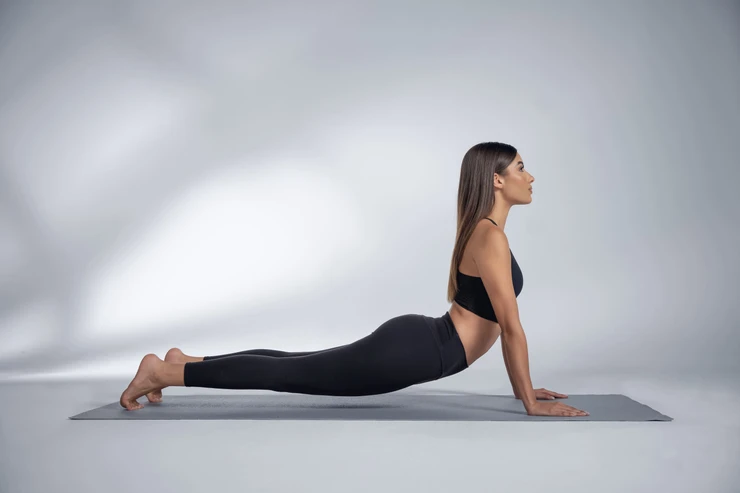 a woman doing upper-body yoga